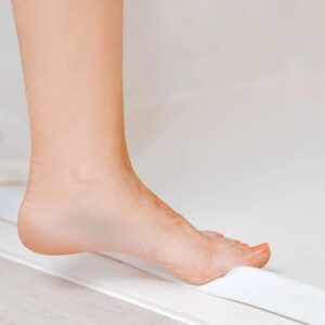 Collapsible Rubber Dam for Barrier Free Shower Bases
